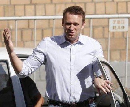 Russian opposition leader and anti-corruption blogger Alexei Navalny reacts as he arrives