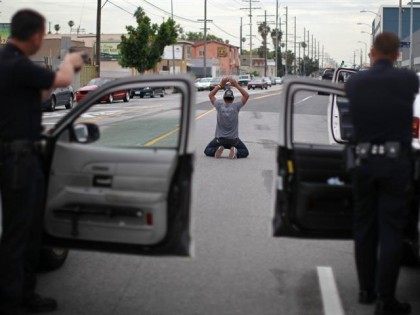 Officers arrest a man suspected of stealing his girlfriend's car in south Los Angeles