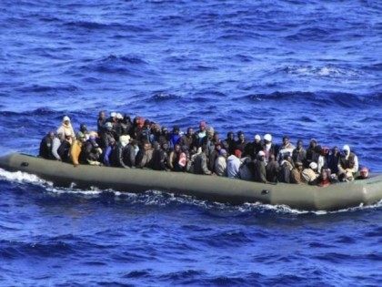 Migrants being approached by Italian navy in Mediterranean
