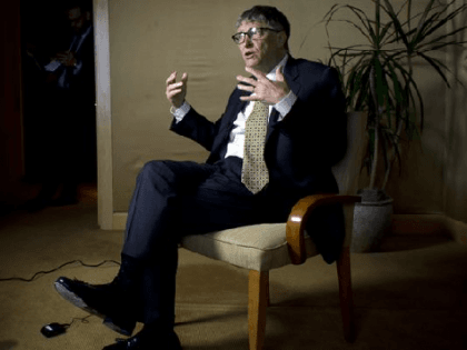Bill-Gates-seated-talking-AFP