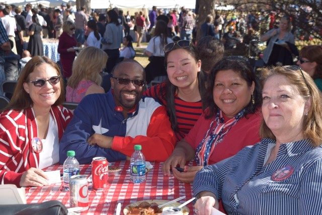 Texans enjoying the inauguration barbecue - Photo by Lana Shadwick