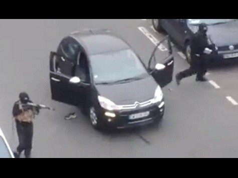 Gunmen at their car during the attack