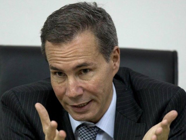 Alberto Nisman, the prosecutor investigating the 1994 bombing the Argentine-Israeli Mutual Association community center, talks to journalists in Buenos Aires, Argentina
