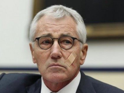 U.S. Secretary of Defense Chuck Hagel listens during his testimony at the House Armed Services Committee on Capitol Hill in Washington