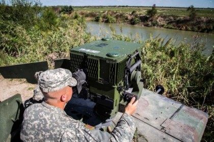 36th Infantry Division, Texas National Guard Soldier on the Rio Grande River. U.S. Army Ph