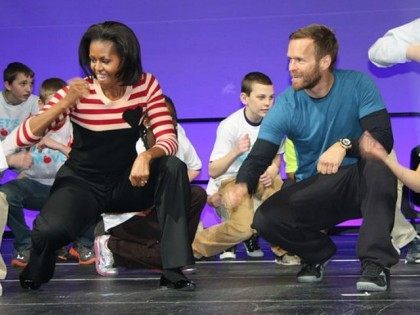 Agriculture Secretary Tom Vilsack joined First Lady Michelle Obama in Des Moines, IA, to kick off a nationwide tour celebrating the second anniversary of "Lets"s Move". They were joined by fitness expert Bob Harper, WNBA star Tamika Catchings, Olympians Michelle Kwan and Shawn Johnson and others, including 10,000 sixth and …