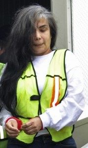 FILE - In this Aug. 20, 2013, file photo, provided by Mexico's Interior Department shows Sandra Avila Beltran in handcuffs as she is escorted by federal authorities upon arrival to Benito Juarez airport in Mexico City. A Mexican federal judge has thrown out a five-year, money-laundering sentence against Avila, ordering the immediate release of the so-called Queen of the Pacific for her alleged role as a liaison between Mexican and Colombian cartels. A statement issued Saturday Feb. 7, 2015, by the Attorney Generals Office says the judge ruled that Avila had already been tried for the same crime in Mexico and the United States.