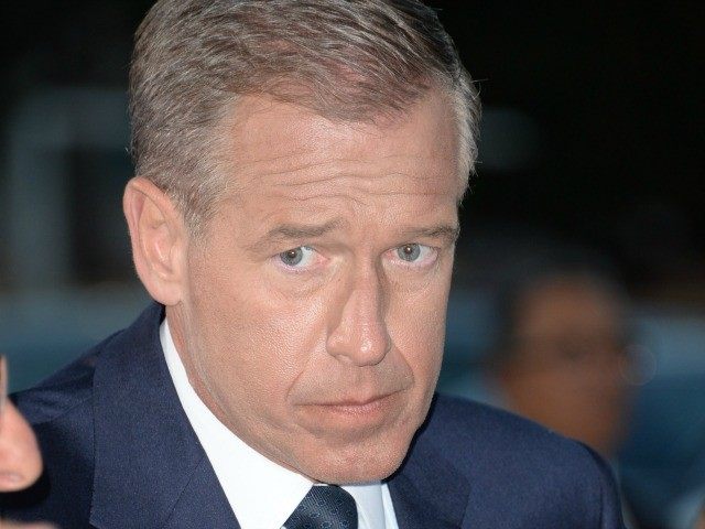 NBC network news anchorman Brian Williams arrives for the world premiere of "Neighbors," April 28, 2014 at the Regency Village Theater in Los Angeles, California.