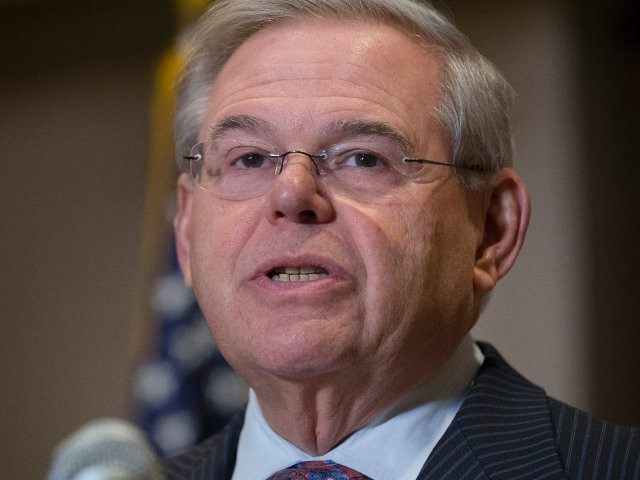 Sen. Bob Menendez, D-N.J., speaks to reporters during a news conference in Newark, N.J. on Friday, March 6, 2015. A person familiar with a federal investigation says the Justice Department is expected to bring criminal charges against the New Jersey Democrat in the coming weeks. Menendez says that he has …
