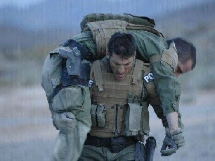 Photograph of Brian Terry carrying a BORTAC agent during training. Photo Courtesy Brian Terry Foundation.