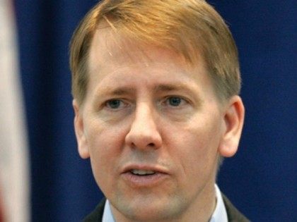This Jan. 8, 2009 file photo shows Ohio's Attorney General Richard Cordray during his swearing-in ceremony in Columbus, Ohio.