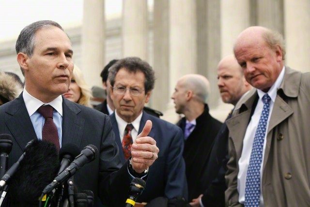 Attorney General of Oklahoma Pruitt, a critic of the U.S. government in the King v. Burwell case, speaks to reporters after arguments at the Supreme Court building in Washington
