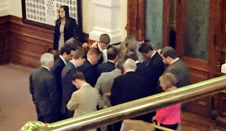 Texas Pro-Life State Reps. pause to pray before floor debate. Facebook/Jeff Leach.