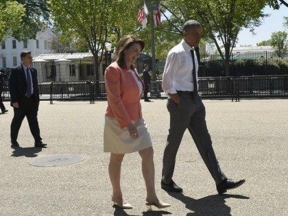 President Barack Obama takes a walk along Pennsylvania Avenue in Washington, Wednesday, Ap