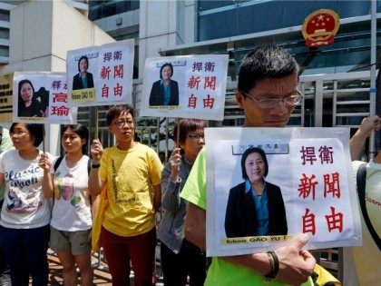 AP Photo/Kin Cheung