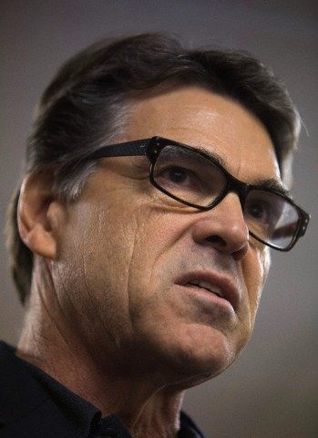 Texas Governor Rick Perry speaks to supporters of Republican senatorial candidate Bill Cassidy during a rally for Cassidy in Lafayette