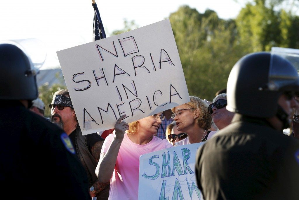 Women attend "Freedom of Speech Rally Round II" across street from Islamic Community Center in Phoenix
