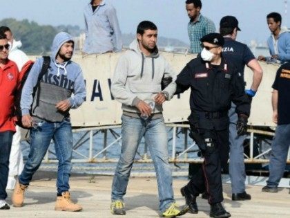 Tunisian-migrants-disembark-in-Sicily-afp