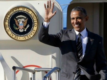 President Barack Obama waves as he arrives in Portland, Ore., Thursday, May 7, 2015. On Fr