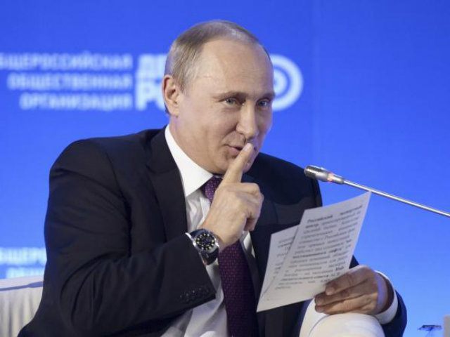 Russian President Vladimir Putin gestures during the Business Russia forum …