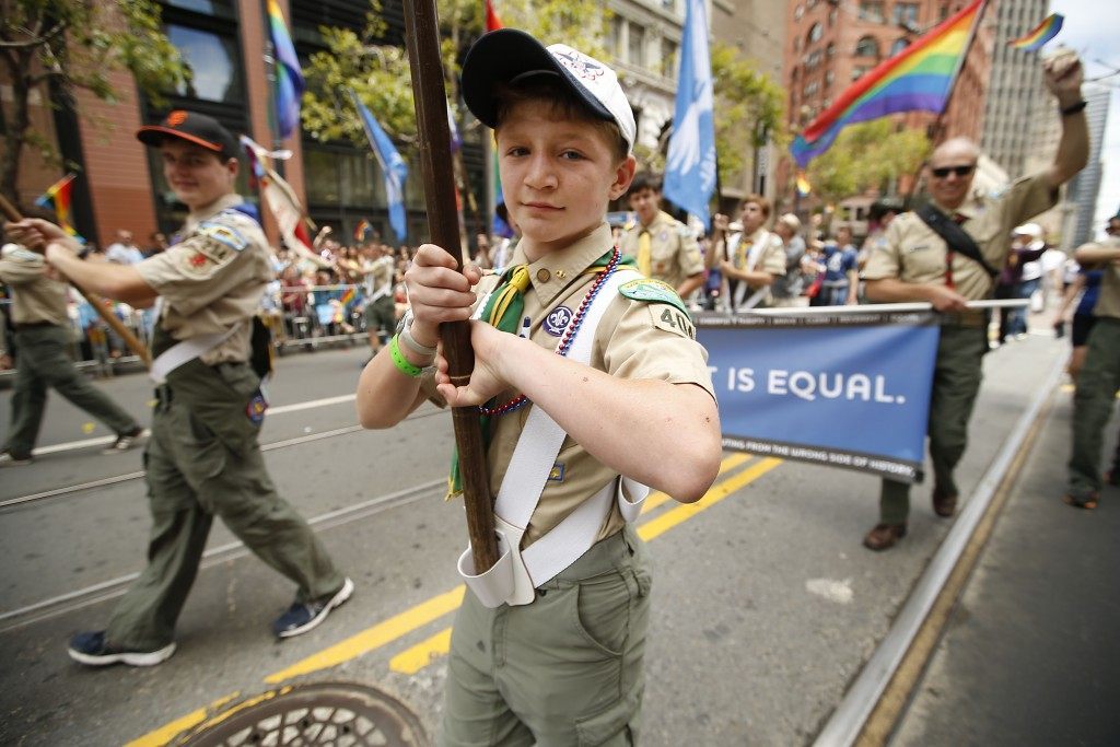 Gabriel Anderson marches with Scouts for Equality during the 45th annual San Francisco Gay Pride parade Sunday, June 28, 2015, in San Francisco. (AP Photo/ Tony Avelar)