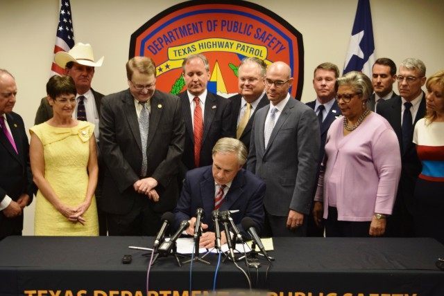 Texas Governor Greg Abbott signs Texas border security bills into law. (Photo: Breitbart T