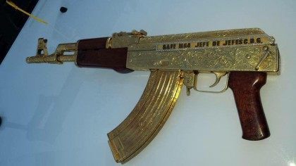 Gold plated AK-47 with an inscription identifying it as belonging to Gulf Cartel Commander