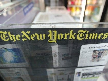 NEW YORK - JULY 23: A New York Times newsrack is seen July 23, 2008 in New York City. The Times is set to raise the daily newsstand price to $1.50 August 18 after posting an 82 percent decline in second quarter profits. (Photo by Mario Tama/Getty Images)