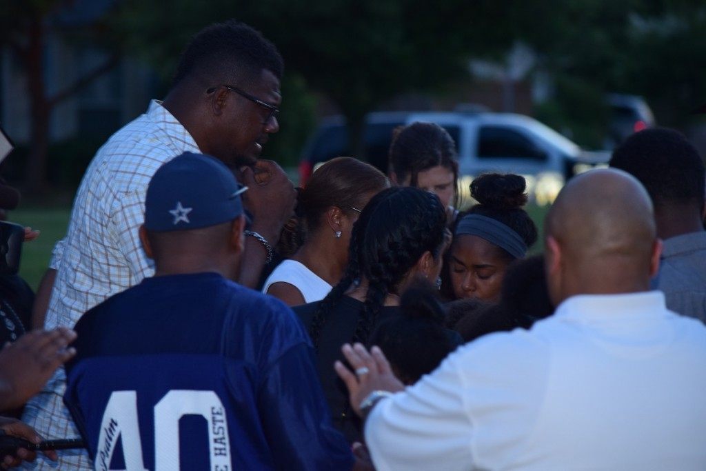 McKinney police keep maintain a protective watch while pastors provide healing prayer for Craig Ranch residents. (Photo: Breitbart Texas/Bob Price)