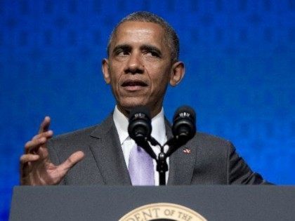 President Barack Obama gestures as he speaks to the Catholic Hospital Association Conference at the Washington Marriott Wardman Park in Washington, Tuesday, June 9, 2015. Obama declared that his 5-year-old health care law is firmly established as the "reality" of health care in America, even as he awaits a Supreme …