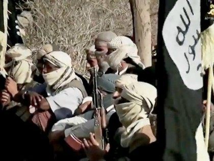 YEMEN, - : An image grab taken on April 16, 2014 from a video released on March 29, 2014 by Al-Malahem Media, the media arm of Al-Qaeda in the Arabian Peninsula (AQAP), allegedly shows AQAP jihadists listening to their chief Nasser al-Wuhayshi at an undisclosed location in Yemen. Wuhayshi has …