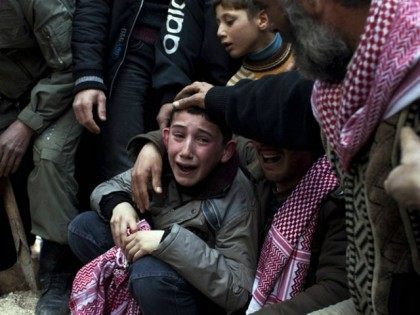 boy-mouns-dad-killed-in-Syrian-Civil-War-ap