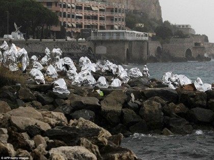 Migrants camped out on the rocks at Ventimiglia