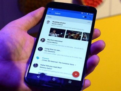 Google's lead designer for 'Inbox by Gmail' Jason Cornwell shows the app's functionalities on a nexus 6 android phone during a media preview in New York on October 29, 2014. Google ramped up its mobile arsenal, upgrading its Nexus line with a new tablet and smartphone, and unveiling its revamped …