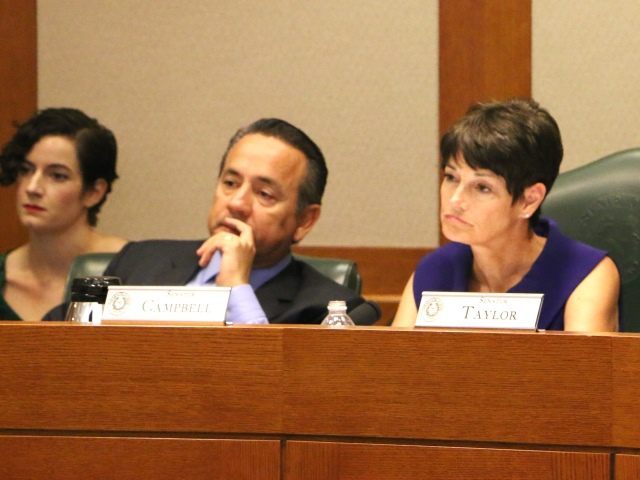 Senators Carlos Uresti (L) and Donna Campbell (R) listening to testimony in Senate Committ
