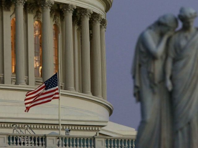 A flag at the U.S. Capitol flies at half staff after President Barack Obama ordered the action while speaking on the shootings at the Sandy Hook Elementary School December 14, 2012 in Washington, DC. Obama called for 'meaningful action' in the wake of the latest school shooting that left 27 …