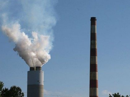 Emissions spew out of a large stack at the coal-fired Morgantown Generating Station June 29, 2015 in Newburg, Maryland. Today the U.S. Supreme Court ruled against the Environmental Protection Agency's (EPA) effort to limit certain power plant emissions -- saying the agency 'unreasonably' failed to consider the cost of the …