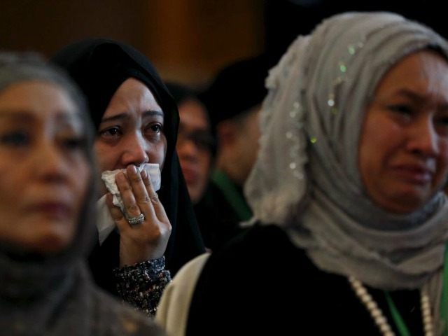 Malaysia Airlines Flight MH17: One Year Later, Victims' Families Demand ...