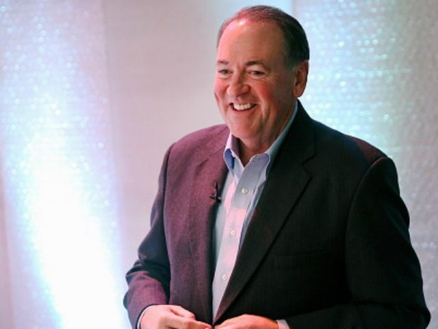 Former Arkansas Governor Mike Huckabee prepares to speak to guests gathered at the Point of Grace Church for the Iowa Faith and Freedom Coalition 2015 Spring Kickoff on April 25, 2015 in Waukee, Iowa. The Iowa Faith & Freedom Coalition, a conservative Christian organization, hosted 9 potential contenders for the …