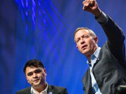 Former Gov. Martin O'Malley (D-MD) (R) speaks of his commitments at the Netroots Nati
