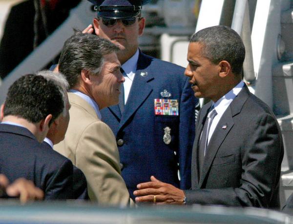 Governor Perry shakes hands with President Obama in Texas just before handing him a letter on Border Security. AP Photo/Jack Plunkett