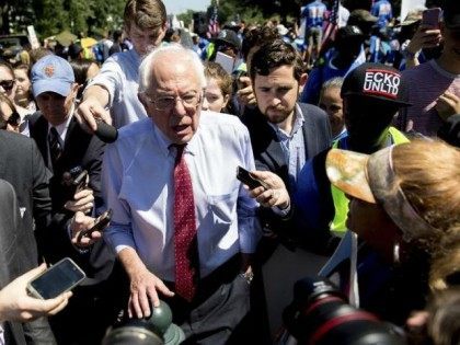 Democratic presidential candidate Sen. Bernie Sanders, I-Vt., speaks to reporters after sp