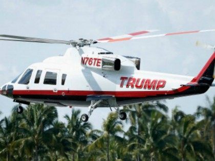 The Trump Organization helicopter lands on the course during a practice round prior to the start of the World Golf Championships-Cadillac Championship at Trump National Doral on March 5, 2014 in Doral, Florida.