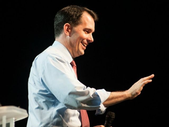 Scott Walker waves during the Western Conservative Summit at the Colorado Convention Cente