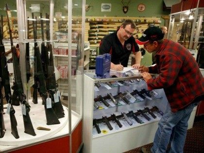 buying-selling-guns-AP