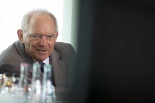 German Finance Minister Schaeuble attends the weekly cabinet meeting at the Chancellery in