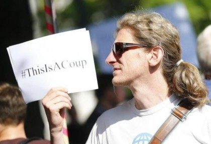 A demonstrator protests against the third bailout for Greece outside Germany's parliament,