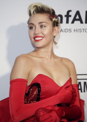 Miley Cyrus says she's proud of coming out
