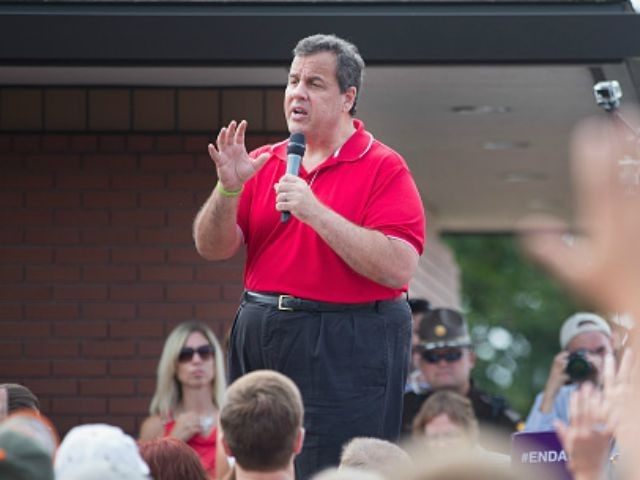 Republican presidential candidate New Jersey Governor Chris Christie speaks to visitors at