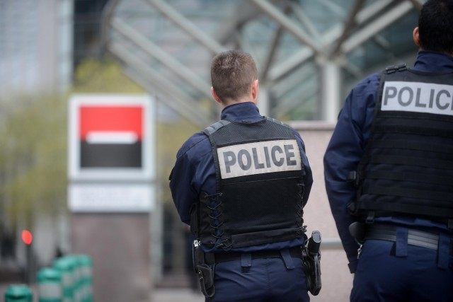 Paris Police Hunt Gunman Following Attacks At Newspaper And Bank